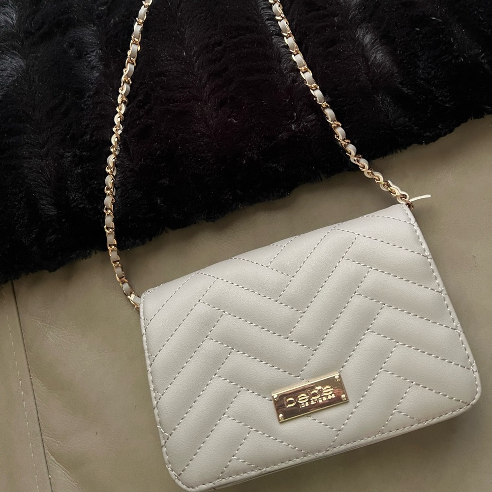 New light grey Bebe crossbody purse! Never been used price to sell!
